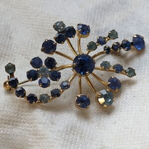 Vintage Austrian Gold Tone Pin With a Variety of Blue Crystals